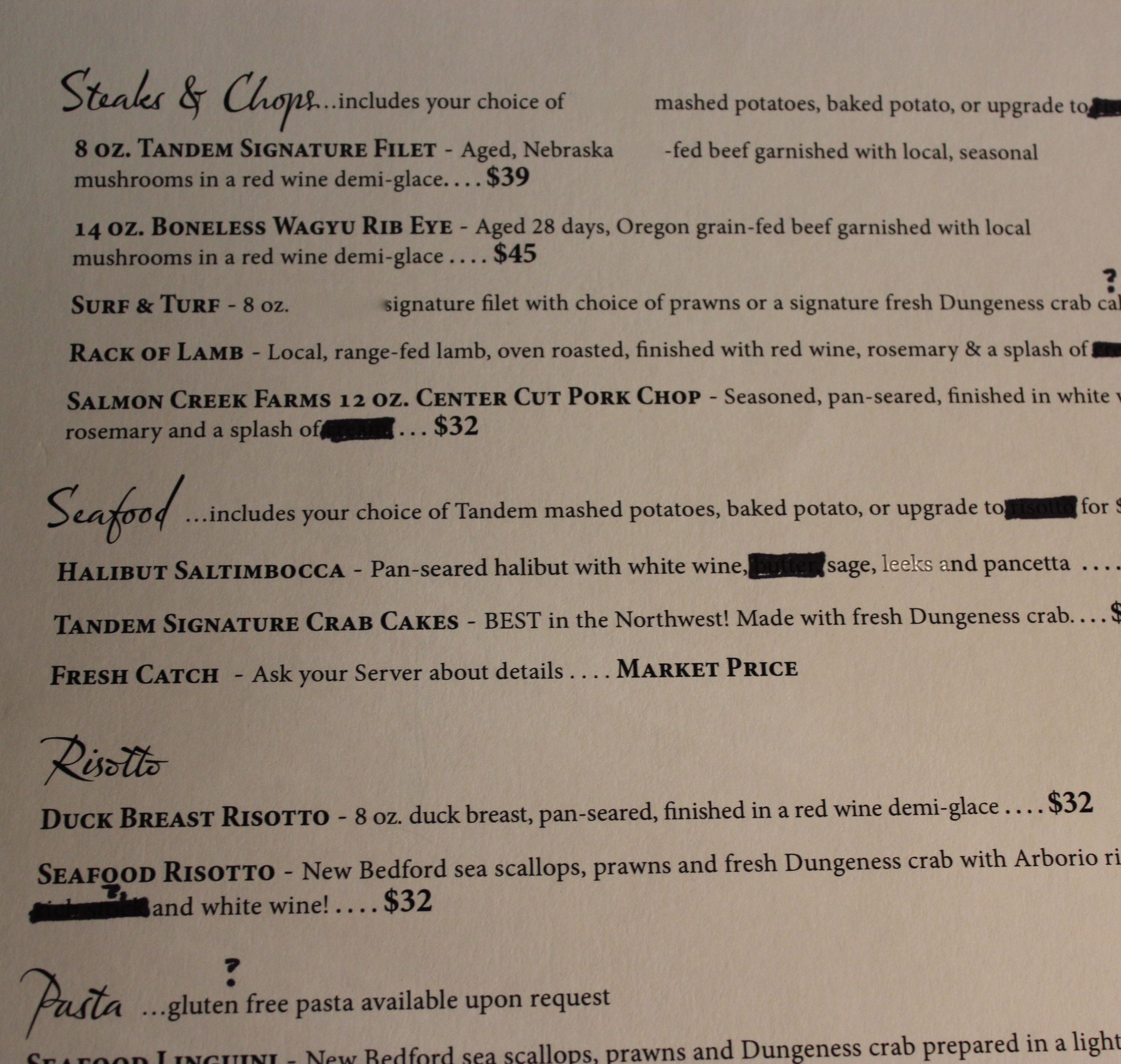 Another section of the same printed menu as used in the former two pictures, with ingredients blacked out.